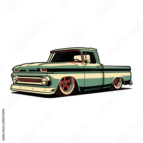Low rider style vintage pickup truck with custom green paint