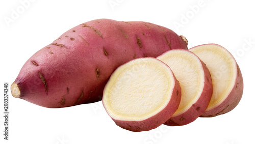 Cuadro en lienzo Whole and sliced red sweet potato with creamy yellow flesh