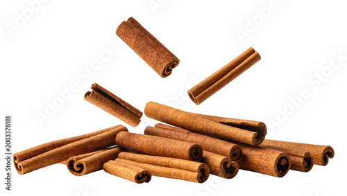 Konstfotografi Cinnamon sticks pile spice, natural wood texture