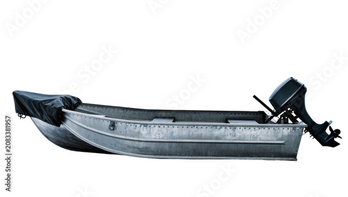 Obraz na płótnie Aluminum fishing boat with outboard motor and cover