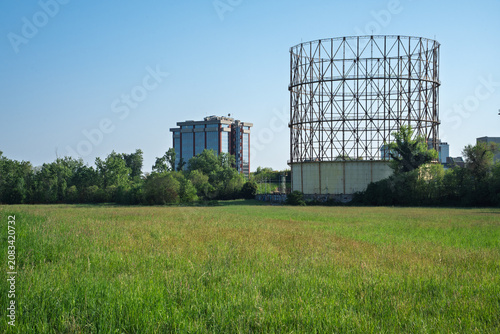 Schilderij op canvas Historic A2A gasometer and office building in Forlanini Park, Milan