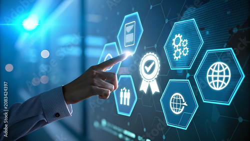 Person Touching Digital Interface with Quality Assurance Icons in Blue Light