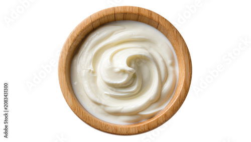 Fotografie Creamy white yogurt swirl in wooden bowl
