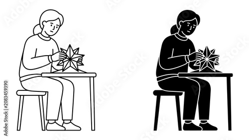 Fotografie Crafting with Care: A person sits at a table, diligently working on a handmade decorative star, engrossed in the meticulous process of crafting