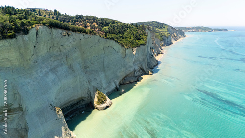 Loggas beach Corfu with steep limestone cliffs