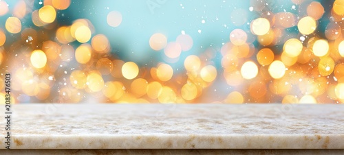 A stone surface rests before a soft-focus background of warm, twinkling lights