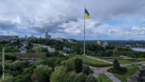 Kyiv skyline with sovereign Ukrainian flag