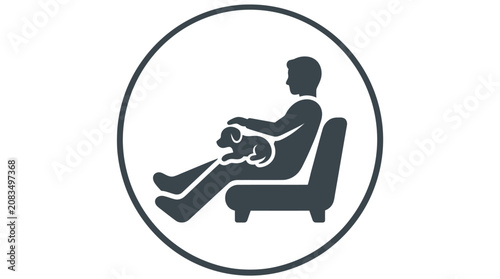 Photos Person sitting in a chair.