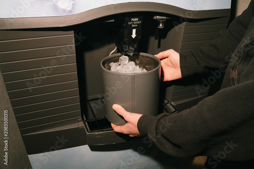 Filling Hotel Ice Bucket at Ice Machine