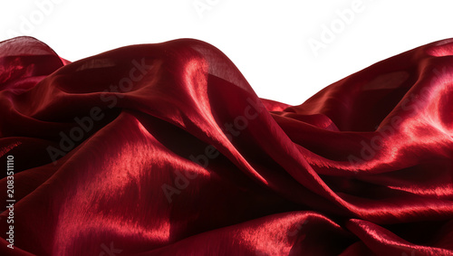 Photos Flowing draped deep red satin fabric with highlights