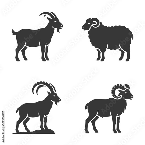 фотографія Black silhouette goats with horns standing.