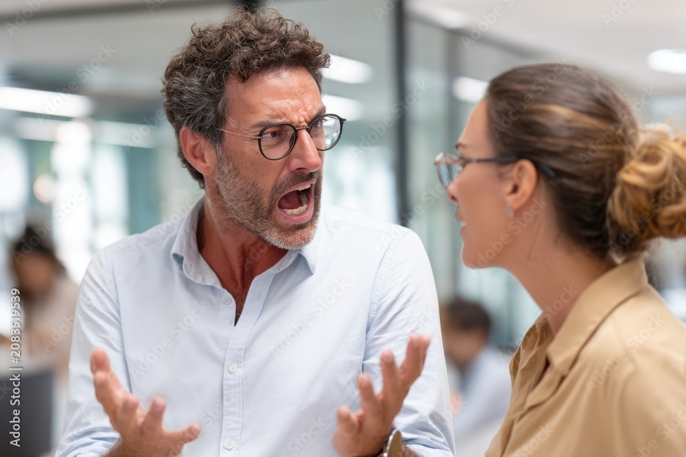 Fototapeta premium Frustrated man in office conversation