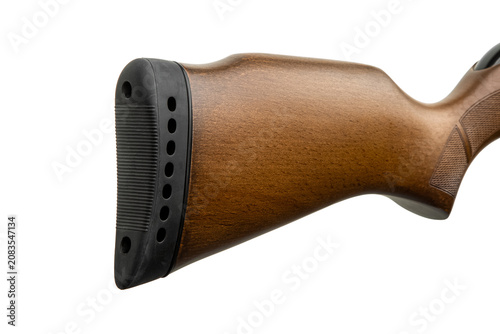 Obraz na plátně Close-up of a rifle wooden buttstock with a black rubber recoil pad, isolated on