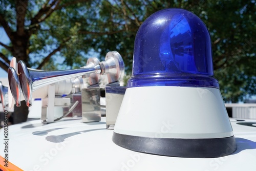 Fotografie Blue emergency beacons and air horns on rescue vehicle roof