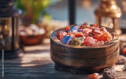 Closeup of Colorful Stones in Wooden Bowl with Decorative Elements