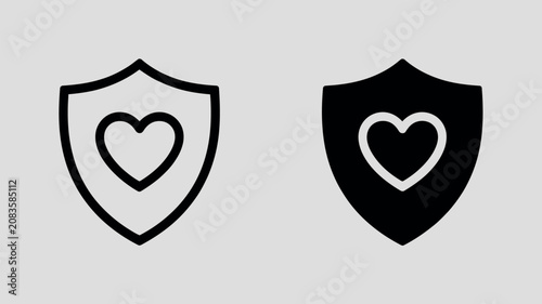 Two shield icons with heart symbol for protection and love