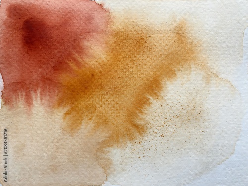 Earthy watercolor texture with warm burnt sienna and ochre pigments blending on textured white paper surface