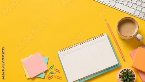 Bright Happy Monday Planner Workspace on Yellow Desk