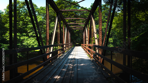 Claremont Railway Bridge over the Sugar River in Claremont, New Hampshire, built in 1903, a historic riveted steel Warren deck truss bridge in New England, United States of America