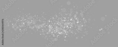Luxury silver sparkle effect shines with radiant particles and festive transparent illumination. Soft glitter trails flow through shimmering dust, glowing stars and elegant reflections. Vector png.