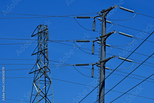 Old and new high voltage electrical pylons 