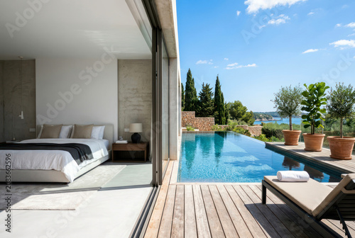 Bedroom in a villa with access to a swimming pool