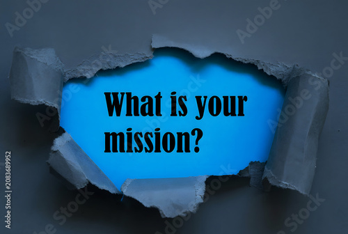 What Is Your Mission Inspirational Message Revealed Through Torn Navy Blue Paper For Purpose Vision And Personal Growth Concept