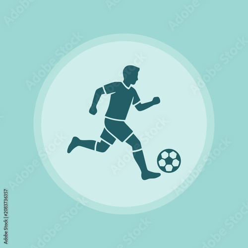 A silhouette of a soccer player running with a ball