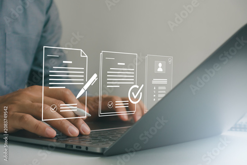 Konstfotografi Businessman using laptop with digital user profile form