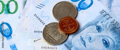 Canvas Print Swedish krona money bills and coins on table