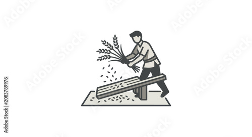 Tablou pe pânză Man threshing wheat by hand tool.