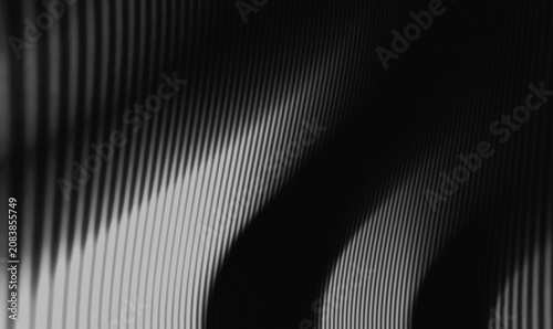 Foto luxury black background with repeating vertical striped line patterns with organ