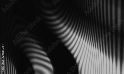 Foto luxury black background with repeating vertical striped line patterns with organ
