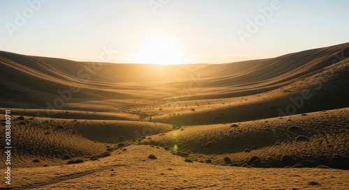 Golden Sunrise Over Rolling Hills and Valleys