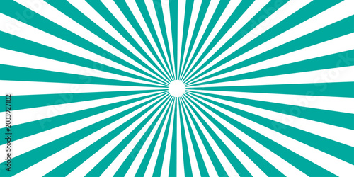 Quadro su tela A radiant burst of teal and white rays emanates from a central circle, creating a dynamic and energetic graphic background that suggests growth or expansion