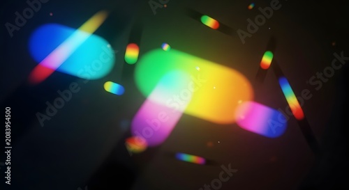 Vibrant rainbow light leaks and blurred capsule shapes on a dark background