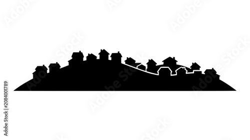 Silhouette of a small village or neighborhood on a hill