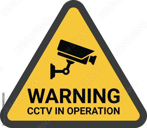 Yellow warning sign cctv camera surveillance in operation