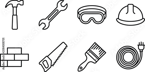 Building and renovation tools arranged in a clean composition with a white background for design