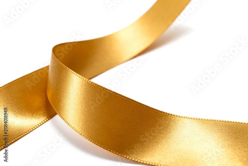 Golden Satin Ribbon on White Background