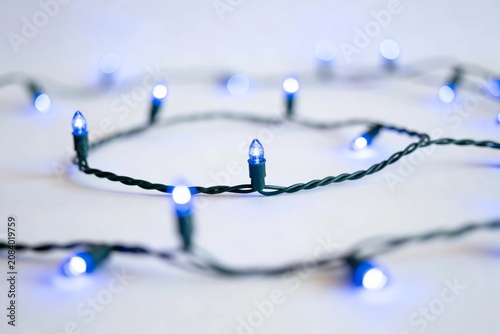 Blue Christmas Lights on White Background