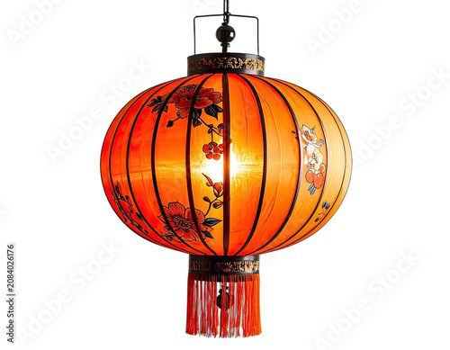 A glowing orange lantern adorned with floral patterns hangs against a dark background.