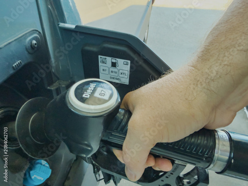 Refueling Car at Gas Station