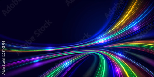 Fotografía Abstract colorful light trails curving and flowing across a dark background, evoking a sense of speed, energy, and digital motion