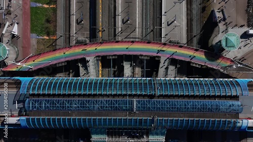 Aerial view of train station with rainbow bridge