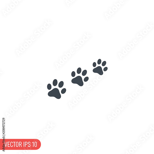 Black dog paw prints trail.