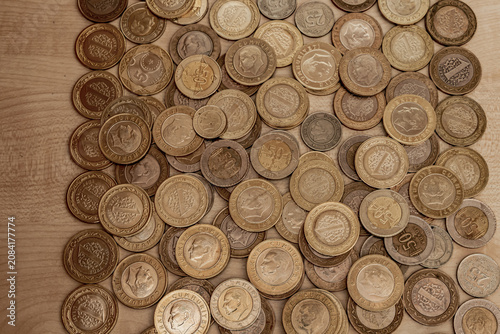 Close-up view of Turkish lira banknotes and coins arranged as a financial background. Ideal for illustrating concepts such as economy, inflation, savings, investment and business in Türkiye.