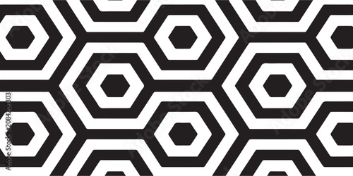 Seamless monochrome pattern featuring repeating geometric hexagon shapes in black and white.