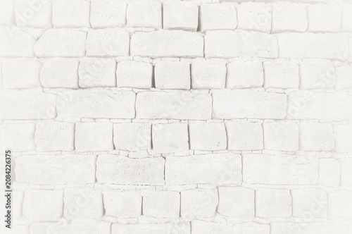 light-colored brick wall