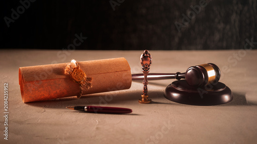 Photography Gavel Notary's public pen and stamp on testament and last will